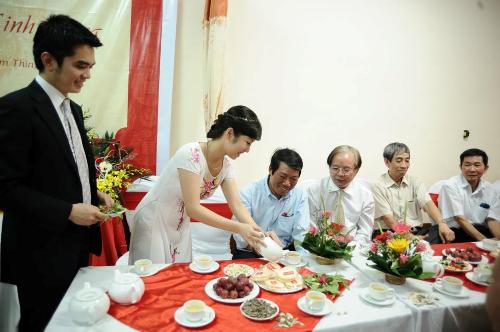 Bride inviting tea