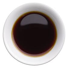 A small bowl of soy sauce