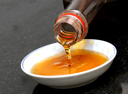 Pouring fish sauce